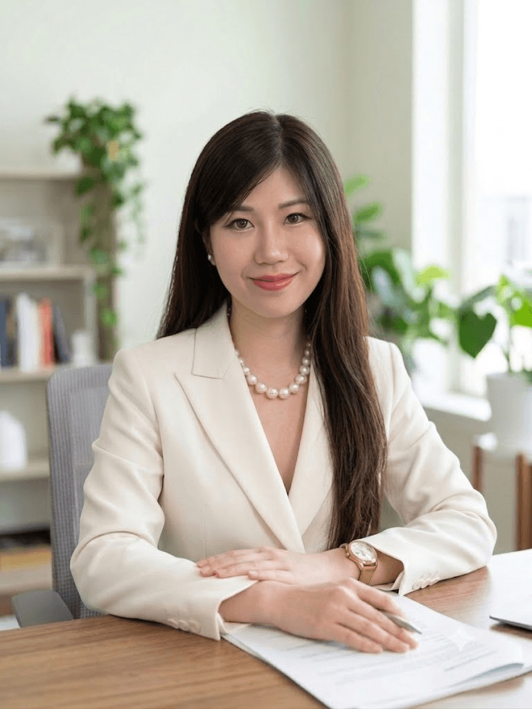 Ada Peng, healthcare PPC consultant, at her desk